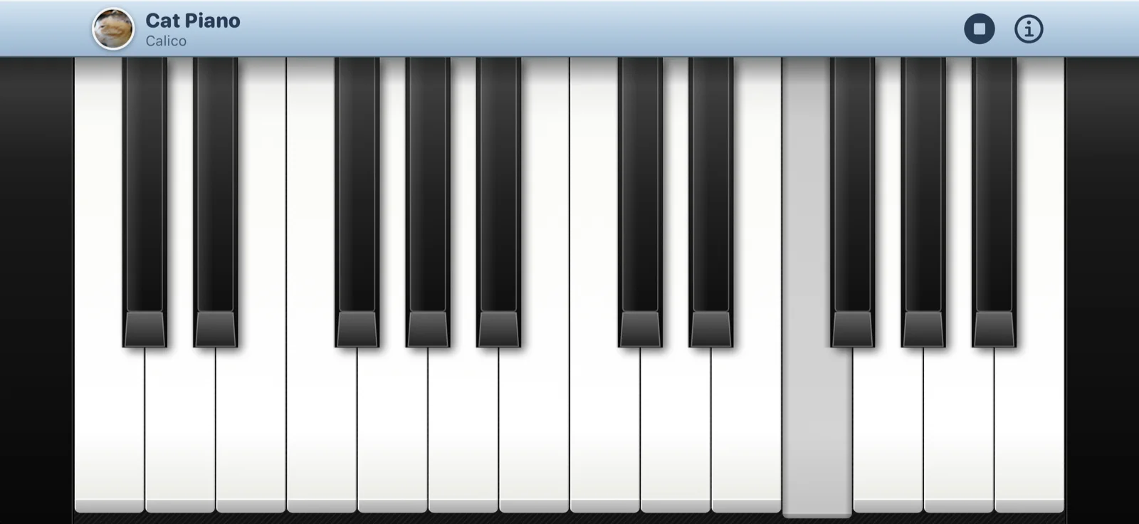 A tune playing on Cat Piano, an iPhone held sideways, one key lit and the stop button in the bar
