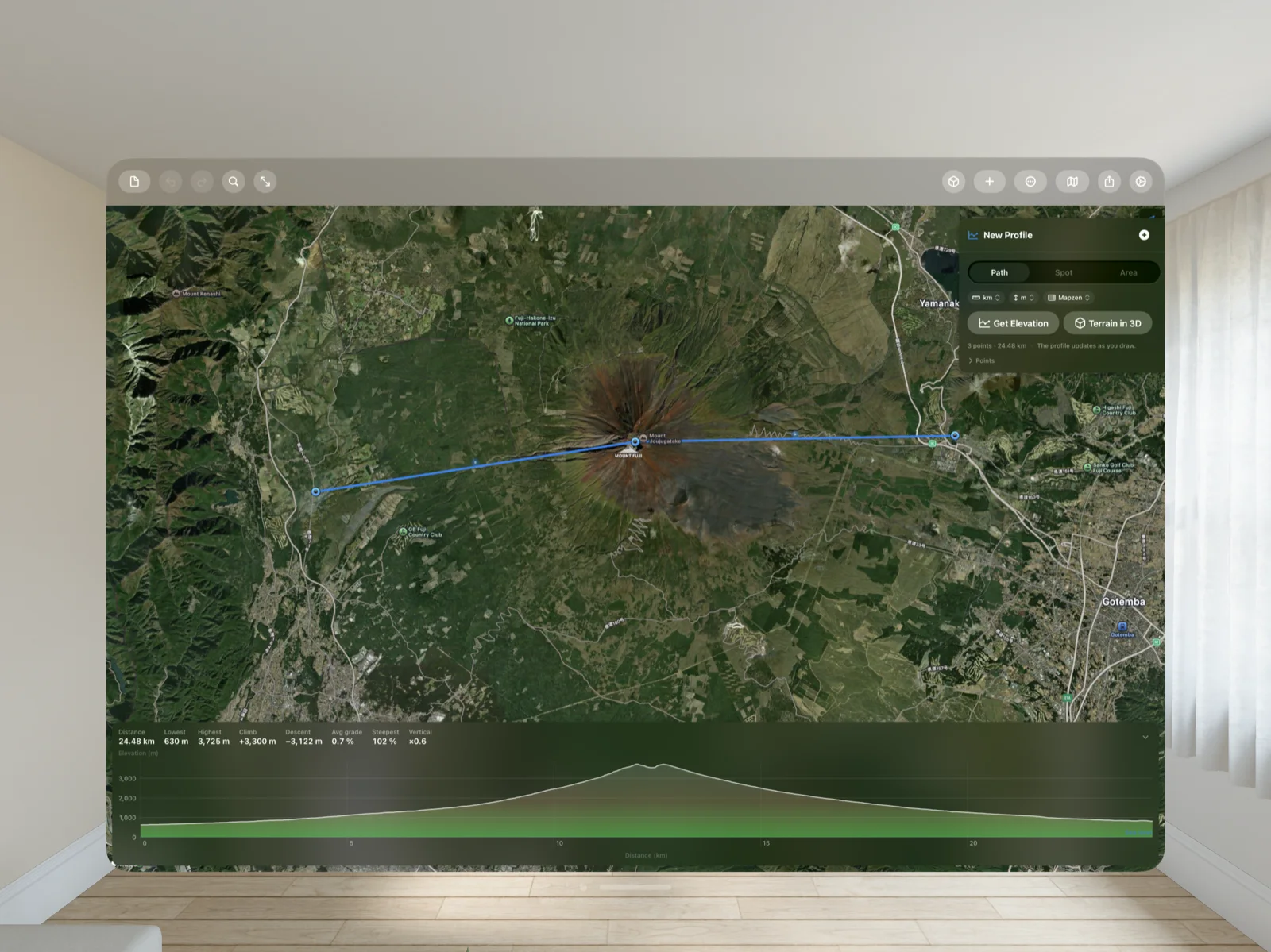Geo Elevation on Apple Vision Pro: a window in a living room with a path across Mount Fuji and its profile