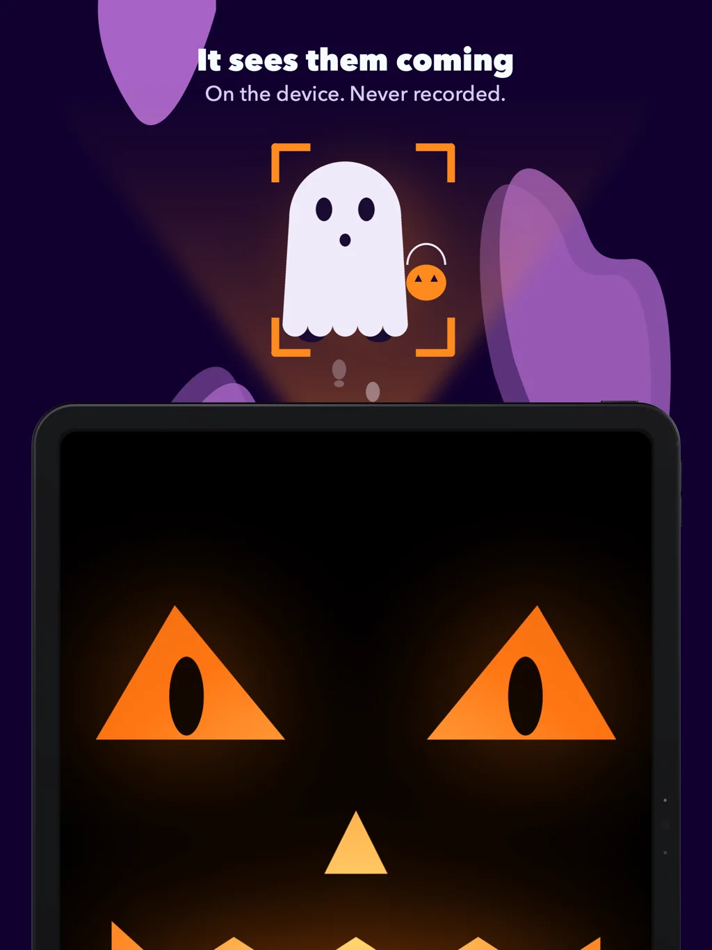 iHalloween on an iPad, the visitor in the camera’s view above the watching pumpkin