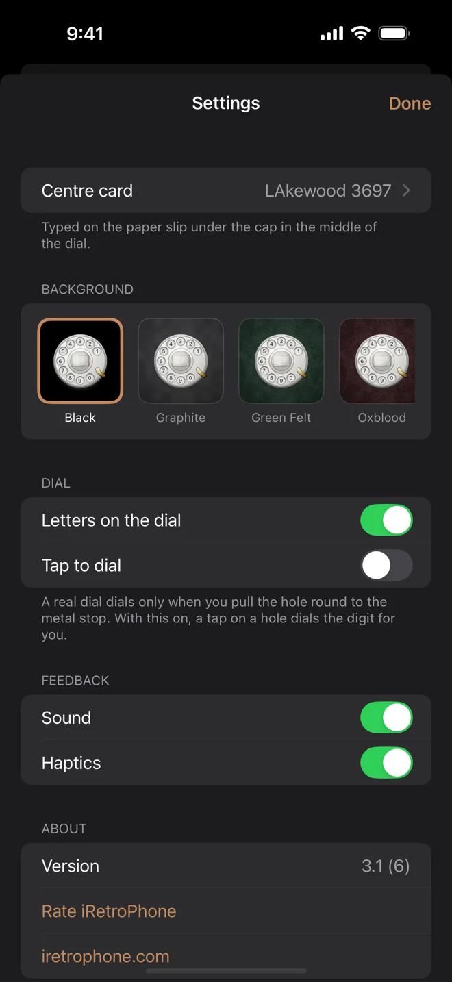 The Settings screen: the centre card text, a row of table surfaces, letters on the dial, Tap to dial, sound and haptics switches