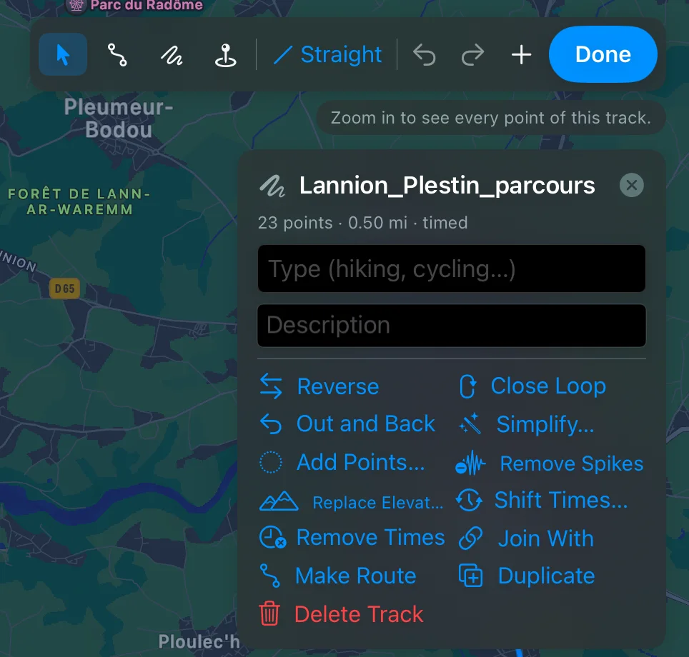 A selected track's panel on iPad in edit mode: its name, 23 points, 0.50 mi, timed, the Type and Description fields, and the tools from Reverse to Delete Track, under the edit bar